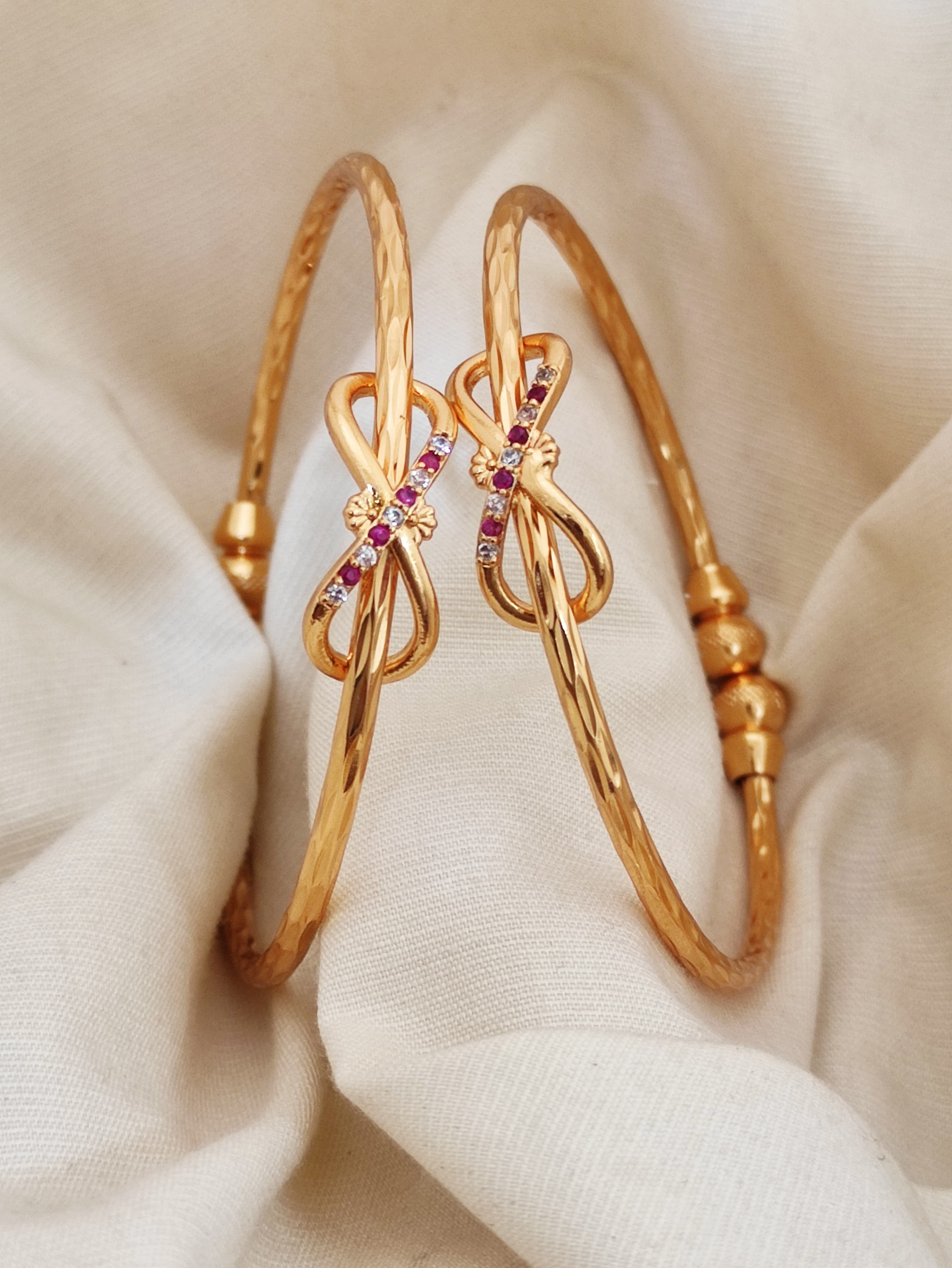 Stylish Infinity Kadli With Stones Pack Of Two Pieces ( 1 pair)