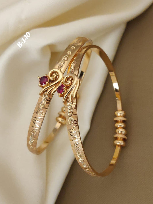 Stylish Daily Wear Golden Bangles With American Diamond