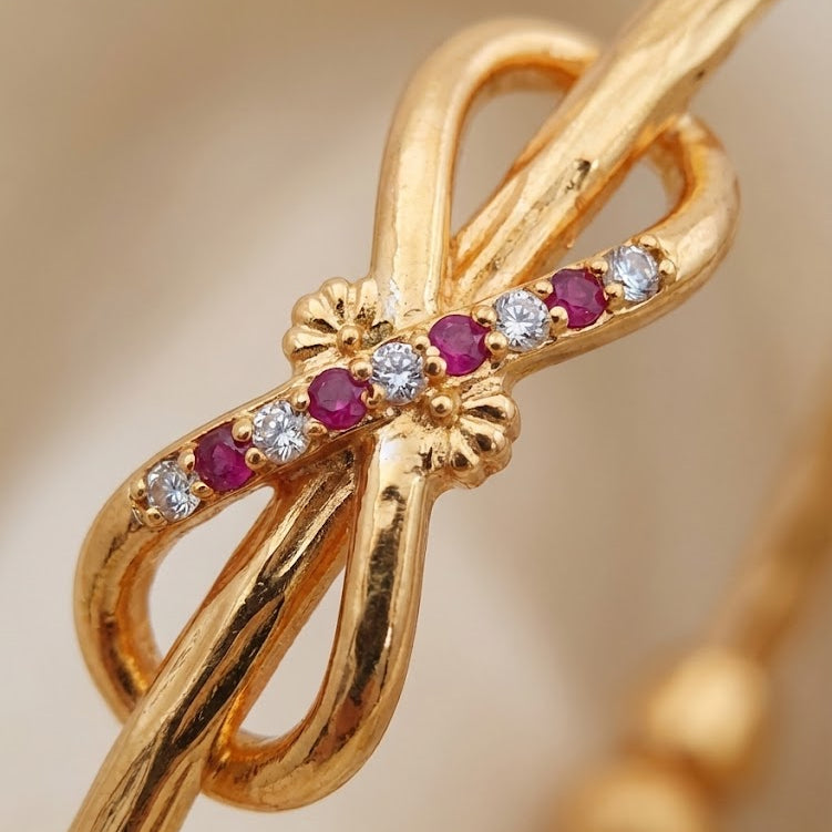 Stylish Infinity Kadli With Stones Pack Of Two Pieces ( 1 pair)